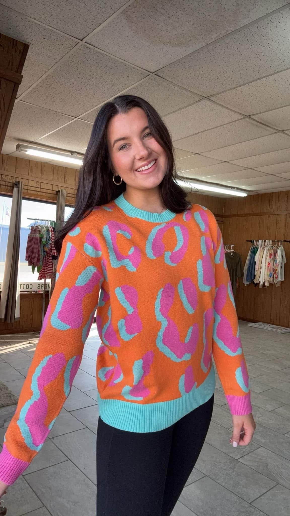 Orange cheetah print sweater